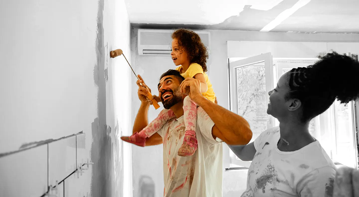 Family decorating new home