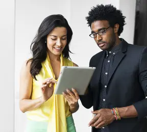 People looking at ipad